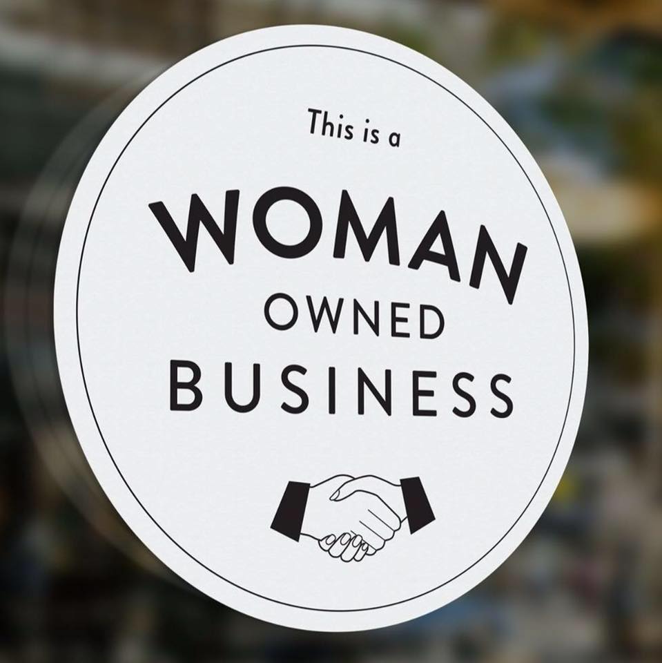 Woman Owned Business Sign in Window
