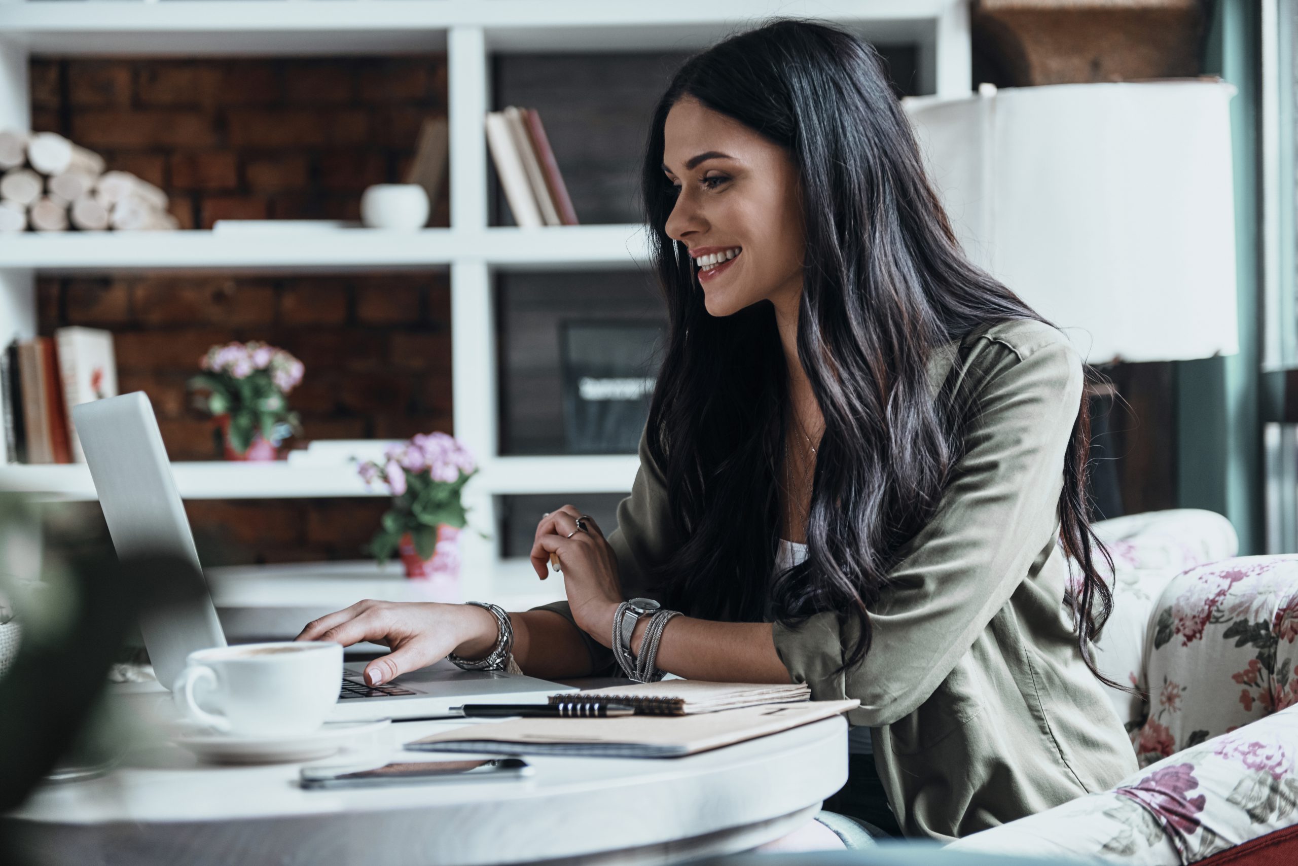 Smiling businesswoman on computer